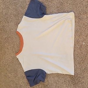 White tshirt with blue sleeves